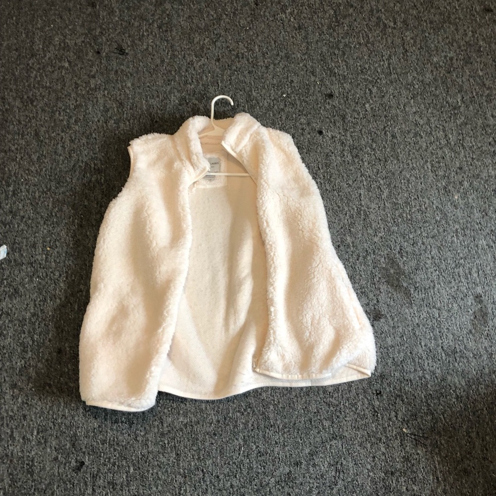 New York Sabrina Lauren creme colored vest.